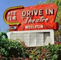 an old neon sign for the drive in theatre at midleton, texas photo via flickon