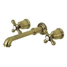 two brass faucets with handles on each side