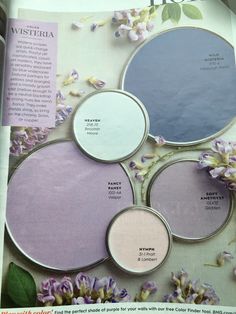 an article in the magazine shows three different shades of paint and one is blue with purple flowers