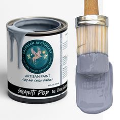 a paint can with a brush in it next to an image of a paintingbrush