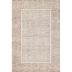 a beige rug with a white border