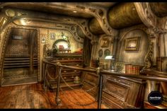 the interior of an old fashioned steampunky house with wooden floors and walls