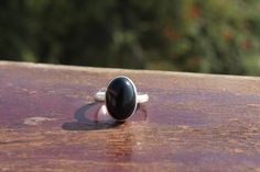 NOTE : WE USED NATURAL GEMSTONES , SO STONE  MAY BE LITTLE DIFFERENT .This  is a listing  of Boho sterling silver ring # metal = sterling silver  925 # Gemstone  - Onyx # Ring Size - Available in all Size # Stone Color - Black# Stone Shape - OvalHandmade Crafting bohemian Ring - This style has bohemian style . it will look beautiful when you wear it ..Thanks for visiting our shop ...  favorite our shop for daily updates ... Minimalist Handmade Black Ring, Black Bohemian Rings With Gemstone, Black Bohemian Gemstone Rings, Bohemian Black Gemstone Rings, Boho Statement Ring, Moonstone Ring Sterling Silver, Bohemian Ring, Black Onyx Stone, Rainbow Moonstone Ring