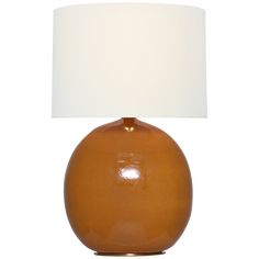 a brown table lamp with a white shade on it