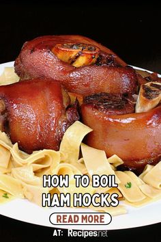 a plate full of ham and noodles with the words how to boil ham hocks