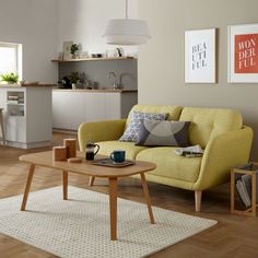 a living room filled with furniture and decor