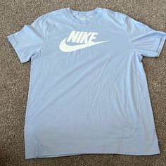 Nike Men’s T-Shirt Light Blue With White Logo Size L New Without Tags Baby Blue Tshirt, Nike Light, Shirts Nike, Blue Tee, Nike Shirts, Blue Tshirt, Mens Tees, Nike Men, Colorful Shirts