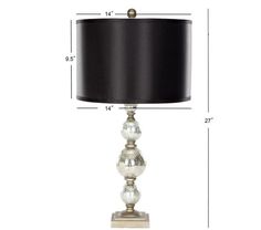 a table lamp with a black shade on it and measurements for the lamps in front