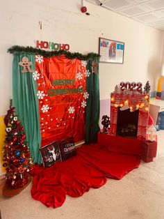 a room decorated for christmas with presents on the floor