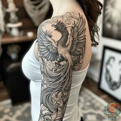 a woman with a bird tattoo on her arm