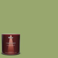 a can of marquee paint on a green background