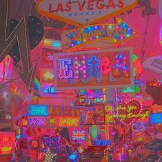 neon lights and signs adorn the las vegas strip