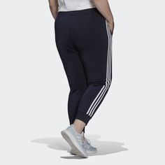 adidas Stay comfortable to stay motivated. These adidas track pants fit close to the body for zero distractions. Cinch down the drawcord to help the pants stay put, whether you're climbing stairs or running errands. Front pockets keep your music player and spare change conveniently stashed.Made with 100% recycled materials, this product represents just one of our solutions to help end plastic waste. Adidas Sportswear Sweatpants For Gym, Adidas Athleisure Sweatpants For Gym, Sportswear Joggers With Three Stripes For Gym, Three Stripes Sportswear Joggers For Gym, Adidas Logo Athleisure Joggers For Workout, Adidas Athleisure Joggers For Workout, Sportswear Sweatpants With Three Stripes For Workout, Adidas Athleisure Joggers For Gym, Casual Adidas Sweatpants For Workout