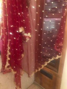 More dupatta here in our collection https://www.etsy.com/shop/neelcreations/?section_id=15880219 This Dupatta is sequin embroidered on net with beautiful golden border scallop. This can we your wedding dress chunni for Indian occasion wear for festival. This has perfect bling for you to look classy and ethnic at same time. This can even be your home decoration fabric for you can even wear them with lehenga. This can be made in any color. We can even make a jacket or poncho out of this. NOTE : Th Red Chanderi Choli With Dabka Work, Red Traditional Wear With Sheer Dupatta, Red Traditional Wear With Sheer Dupatta And Kundan, Red Chanderi Dupatta With Dabka Work, Red Traditional Wear With Dabka Work And Traditional Drape, Red Traditional Wear With Dabka Work, Red Saree With Sheer Dupatta For Eid, Red Traditional Wear With Sheer Dupatta In Nida, Red Traditional Wear With Sheer Dupatta For Diwali