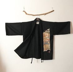 "Collectable black melton wool haori inspired jacket with dancing cranes gold kimono silk panel free size ready to wear This jacket is one of the kind ready to wear. custom order is not available. material: black melton wool soft and smooth to touch vintage kimono silk panel ( dancing cranes with gold tone) design: free size haori inspired jacket with vintage kimono silk panel measurements: length 34\"- 34.5\" width back underarm seam to seam when lay flat 28\" / overall width is about 56\" room Black Long Sleeve Kimono For Tea Ceremony, Long Sleeve Black Kimono For Tea Ceremony, Traditional Black Kimono For Fall, Traditional Black Fall Kimono, Black Kimono For Fall, Gold Kimono, Plus Size Fits, Ethical Clothing, Vintage Kimono