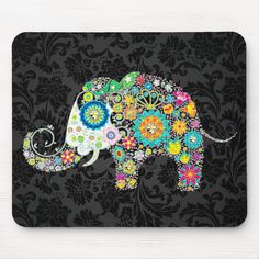 an elephant with colorful flowers on it's back mouse pad for computer and laptops