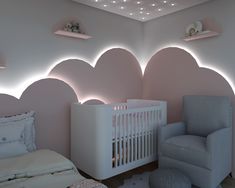 a baby's room with pink walls and white furniture