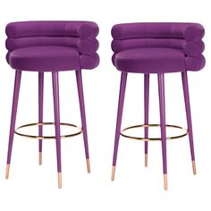 pair of purple velvet bar stools with gold legs