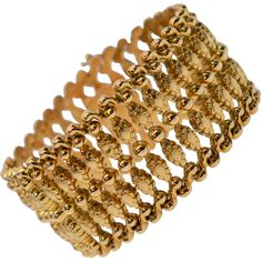 Fabulous circa 1940's in eighteen karat (18K) yellow gold, this retro style ladder bracelet is an undeniable treasure. Measuring 7-1/2 inches long and a remarkable 1-1/4 inches wide, the multiple .750 gold links of this bold piece present a cuff style statement. Stamped 18k by maker and fitted with a safety clasp and safety chain. Gift Boxed. Gold Thumb Rings, Retro Bracelet, Gold Link Bracelet, Rose Gold Beads, Wide Bracelet, Yellow Gold Bracelet, Thumb Rings, Statement Bracelet, Bracelet Crafts