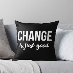 a black and white pillow that says change is just good