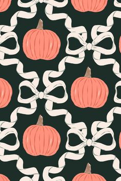 a black background with orange pumpkins and white ribbons