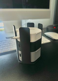 an electronic device sitting on top of a desk