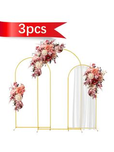 three metal stands with flowers on them and a red ribbon over the top that says 3 pcs