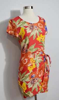 "If you love rayon and you love a sarong dress, this is the dress for you! The colorway makes me think of a summer evening, with its warmer palette. The rayon is soft and has a great drape, as usual. Lovely! 100% Rayon Marked size 3 No visible flaws! Bust 34\" Waist 28\" Hips 36\" Length 32\" ------------------------------------------------------------------------------------------------------- SEE MY SHOP at www.etsy.com/shop/MagicSummerVintage -------------------------------------------------- Red Summer Midi Dress With Tie Waist, Red Tie Waist Midi Dress For Summer, Red Midi Dress With Tie Waist For Summer, Red Ruched Maxi Dress For Beach, Red Tie-waist Maxi Dress For Summer, Red Tie Waist Maxi Dress For Summer, Red Ruched Maxi Dress For The Beach, Red Maxi Dress With Tie Waist For Summer, Red Rayon Beach Dress