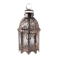 an ornate metal lantern with glass panels