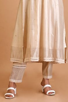 Ivory silk chanderi tunic with floral and thread embroidery. Comes with pant and an inner. - Aza Fashions Off White Raw Silk Straight Kurta Set, Off White Cotton Silk Sets With Resham Embroidery, Transitional Cream Cotton Silk Sets, Cream Embroidered Cotton Silk Set, Designer Silk Sets With Lace Work, Festive Cotton Silk Set With Lace Work, Cream Sets With Sheer Dupatta And Straight Kurta, Festive Cotton Silk Dupatta With Lace Work, Beige Chanderi Sets For Navratri