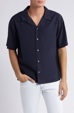 Soft, silky lyocell brings exceptional comfort to a camp shirt styled with a relaxed fit that's perfect for enjoying sunny days. 27" length, 45" chest (size medium) Front button closure Notched collar Short sleeves Chest patch pocket 90% Tencel® lyocell, 10% polyester Tencel lyocell is a more-sustainably produced fiber made with closed-loop processing Machine wash, dry flat Imported Relaxed Fit Camp Shirt With Lapel Collar For Spring, Solid Color Relaxed Fit Camp Shirt For Spring, Short Sleeve Rayon Camp Shirt For Vacation, Solid Spring Button-up Camp Shirt, Spring Solid Button-up Camp Shirt, Relaxed Fit Rayon Camp Shirt With Short Sleeves, Casual Collared Camp Shirt In Rayon, Casual Rayon Camp Shirt For Vacation, Casual Rayon Collared Shirt