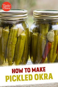 two jars filled with pickled okra sitting on top of a wooden table next to a sign that says how to make pickled okra