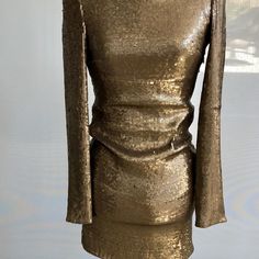 Stunning Bronze Silk Sequin Dress. Form Fitting But Has A Comfortable Spandex Stretch. Fitted Luxury Sequin Dress, Luxury Gold Mini Dress For Evening, Fitted Sequin Dress For Dinner, Elegant Long Sleeve Gold Bodycon Dress, Glamorous Stretch Sheath Dress, Glamorous Stretch Mini Dress For Dinner, Glamorous Sheath Stretch Dress, Luxury Fitted Bodycon Dress For Cocktail, Luxury Bodycon Cocktail Dress