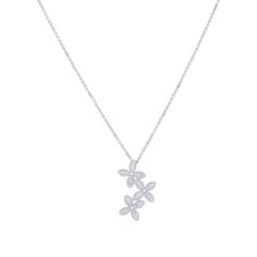 Get ready to turn heads with our Floating Floral Diamond Necklace! Crafted with sterling silver and featuring a delicate floating dogwood design, this necklace is sure to add a touch of elegance to any outfit. The 1/6 carat total weight of natural earth born diamonds will make you feel like a true gem. With an adjustable chain ranging from 16-22", you can customize the perfect fit for any occasion.