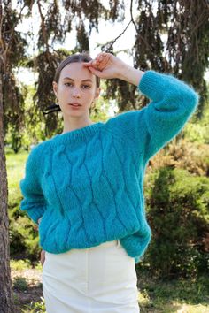 "Turquoise cable knit fluffy women pullover wiht round neck. Product Details: * 100% hand knit * 75% alpaca, 25% merino wool. Regular fit. Size: S(4-6) M(8-10) L(12-14) S Width : 46/48 cm Length: 58/60 cm M Width : 50/52 cm Length: 60 cm L Width : 54 cm Length: 62 cm XL Width : 60 cm Length: 65 cm Please let me know your size. It is made for order. If you would like me in other size, you could request a custom order with your own parameters: your height, bust and length of the sweater from the s Turquoise Outfit, Alpaca Sweater, Womens Sweater, Cable Knit Sweater, Sweaters Oversized, Vintage Sweaters, Women Pullover, Women's Sweater, Cable Knit