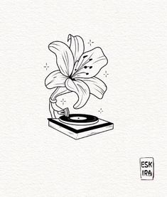 a drawing of a flower sitting on top of a record player's turntable