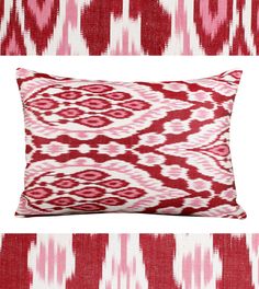 two red and white pillows sitting next to each other