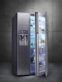 an image of a stainless steel refrigerator with ice and water dispenser in it