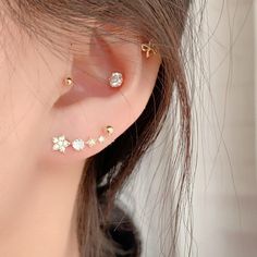 View our 10k solid gold Ear Climber earrings that will add an elegance to your style. Enjoy these gold stars earrings and click to shop now. These piercing studs are great as a gift on Mother's day. Material: 14K Solid Gold (real gold, neither gold plated nor gold filled), White Zircon Measurements: Total length 5.3-13.5 mm, post width 0.8 mm, post length 8 mm, gold ball end 3 mm The white Zircon earrings feature a pair of genuine earth mined Zircons. It is important not to confuse Zircon with C Gold Cubic Zirconia Ear Climbers With Prong Setting, Gold Diamond Ear Climbers For Pierced Ears, Gold Prong Setting Ear Climbers For Gift, Gold Ear Climbers, Ear Climber Earrings, Stars Earrings, Ear Climbers Earrings, Handmade Gold Jewellery, Ear Climber