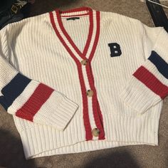 Never Worn Knitted Sweater With The Initial B On The Front. No Wear Or Imperfections In The Sweater At All Button Down Vintage Looking Cardigan White Preppy Cardigan For Winter, Preppy White Cardigan For Fall, White Preppy Cardigan For Fall, Preppy White Winter Cardigan, White Soft Knit Casual Cardigan, White Fall Cardigan For College, White Cardigan For College In Fall, Casual White Soft Knit Cardigan, White Cotton Cable Knit Cardigan