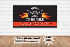 a birthday banner with the words born to be wild on it and flames in the background