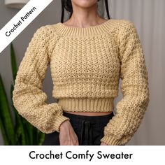 a woman wearing a cropped sweater with her hands on her hips and the text crochet comfy sweater