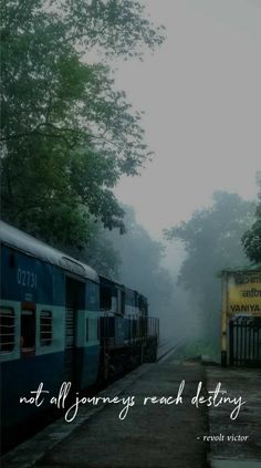 two trains parked next to each other on the tracks in the foggy forest with a quote about not all journey reaching