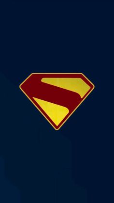 a superman logo is shown against a dark background