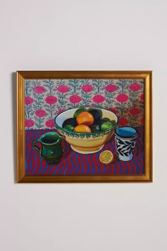 a painting of fruit in a bowl on a table