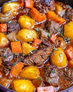 beef stew with carrots and potatoes in a pot