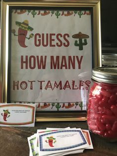 there is a sign that says guess how many hot tamales are in the jar