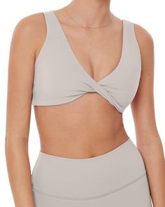 PRICES MAY VARY. ✦FLEXFLOW COLLECTION✦ Athleisure staples for looking good and feeling good from yoga class to the coffee shop with ease and nonstop comfort. ✦BODY HUGGING✦ A soft, comfy feel meets flattering support for light-impact activities and recovery days. ✦FIT AND DESIGN✦ Reversible twist sports bra for supreme comfort through low-intensity workouts, pilates, and sauna sessions. ✦WEAR YOUR WAY✦ Wear the twist in the front or back to control support and coverage. ✦FEATURES✦ Double layered Low Intensity Workout, Bike Rides, Yoga Sports Bra, Padded Sports Bra, Workout Aesthetic, Low Impact Workout, Yoga Bra, Women's Sports, Twist Front