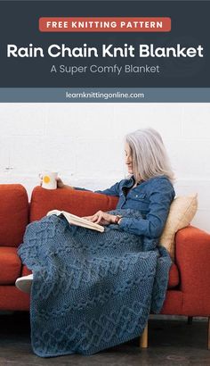 a woman sitting on top of a red couch next to a book titled rain chain knit blanket