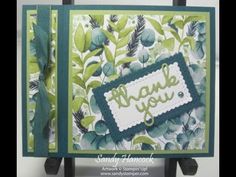 a handmade thank you card with green leaves